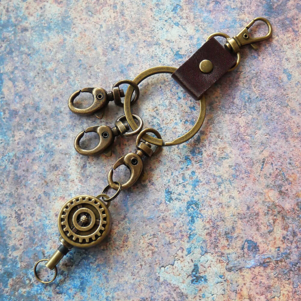 【steampunk】歯車 スチームパンク リール キーホルダー 伸びる ワイヤー